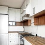 Easy tips for removing grease from kitchen cabinets. You will also discover the clever trick for cleaning sticky wood kitchen cabinets.