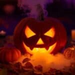 Fog pouring from a carved pumpkin filled with dry ice and water