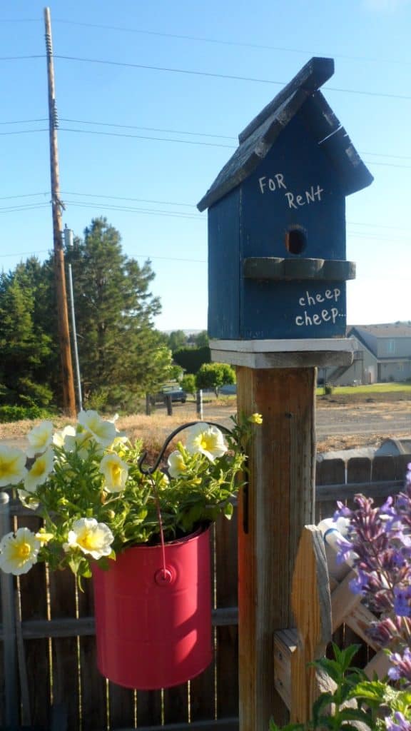 Easy idea for painting a paint can to use as a flower pot.