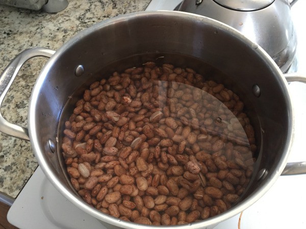 Cooking beans for pressure canning chili.
