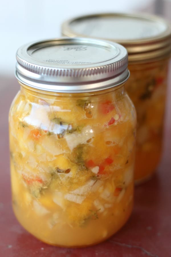 Easy recipe for making and canning peach salsa.