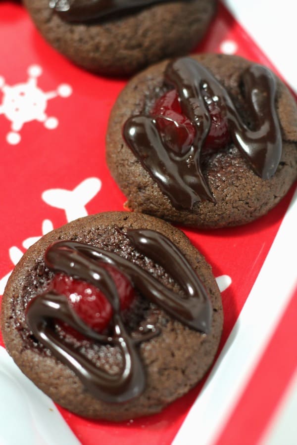 These chocolate cherry cookies are a bit like biting into a chocolate covered cherry! Give this easy cookie recipe a try for your next holiday or Christmas cookie exchange.