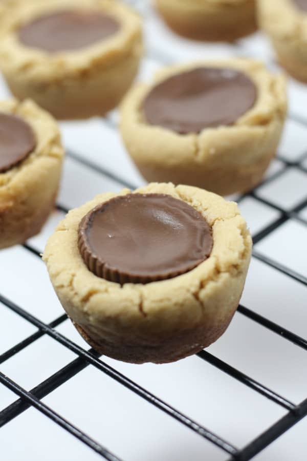 Easy peanut butter cup cookie recipe that is great for Christmas cookie exchanges. One of my favorite holiday baking recipes!