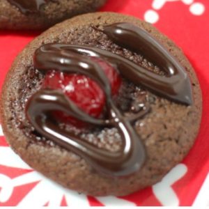 These chocolate cherry cookies are a bit like biting into a chocolate covered cherry! Give these easy cookies a try for your next holiday or Christmas cookie exchange.