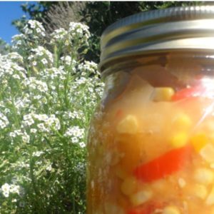 Canning corn salsa. How to make homemade corn salsa with fresh corn on the cob, tomatoes, and onions. Easy recipe for beginning canners.