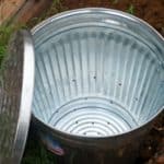 Tips for making your own backyard composter from a galvanized metal garbage can.