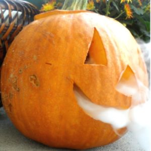 This smoking dry ice pumpkin is a fun decoration to surprise your trick-or-treaters with for Halloween.