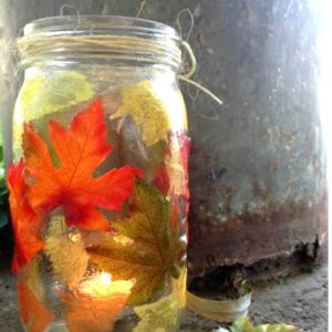 Easy DIY fall craft. How to make fall leaf mason jar candle holders.
