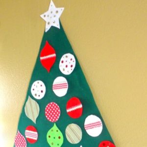 This felt Christmas tree is so easy to make. Kids will love decorating it over and over again.