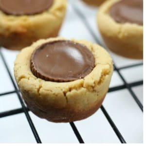 These easy Christmas peanut butter cup cookies are the perfect combination of chocolate and peanut butter. Great for holiday or Christmas cookie exchanges!