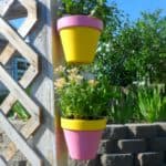 Four fence decorating ideas for your backyard. Some of my favorite creative fence decor!