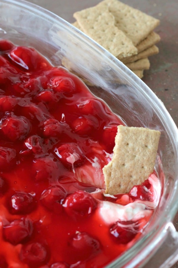 This cherry cheesecake dip is an easy holiday dessert to throw together for holiday parties. Enjoy it as a quick Christmas dessert, or any time.