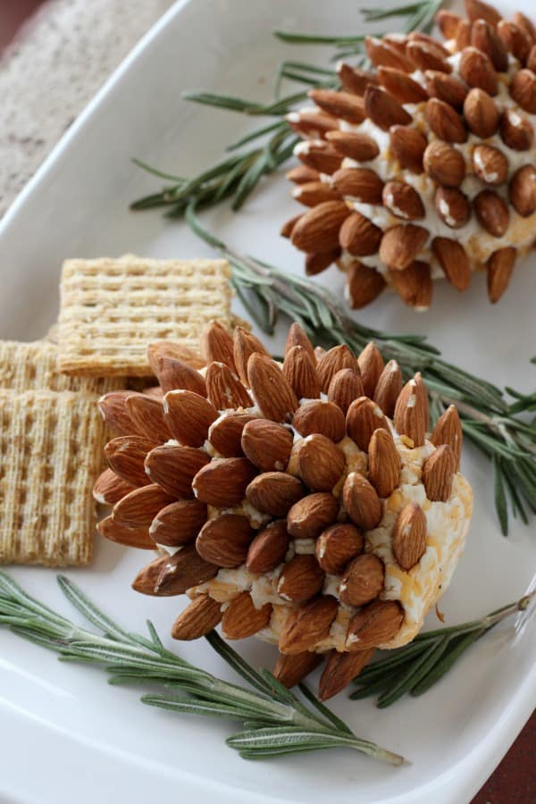 These pinecone cheeseballs are a great holiday party food appetizer idea! Make ahead of time and refrigerate until the day of the party or holiday meal.