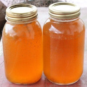 Easy recipe for canning homemade vegetable broth from scraps. The best broth to make for easy dinners.