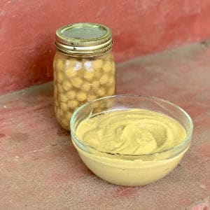 Easy homemade hummus recipe without tahini. One of my favorite recipes for using canned garbanzo beans or chick peas.