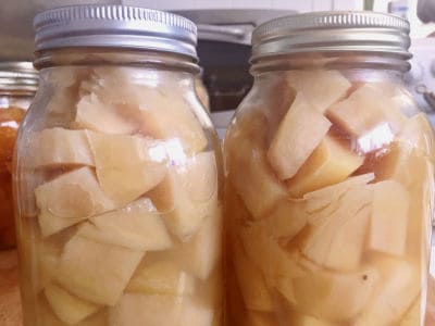 Easy recipe for canning potatoes from your garden. One of my favorite fall canning recipes!
