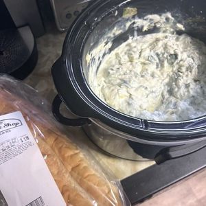 Easy recipe for crock pot spinach artichoke dip. Great holiday appetizer idea!
