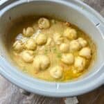 This easy crockpot chicken and dumplings are a quick dinner idea for family! One of my family's favorite comfort foods!