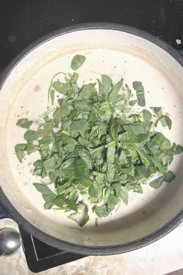 Easy sausage tortellini soup you can make in 30 minutes or less for an easy weeknight meal.