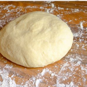 Whip up a mouthwatering sourdough pizza crust in no time with this quick and easy recipe! Perfect for pizza night at home.