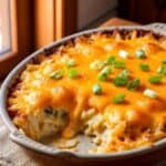 Cheesy funeral potatoes casserole baked to perfection in a casserole dish