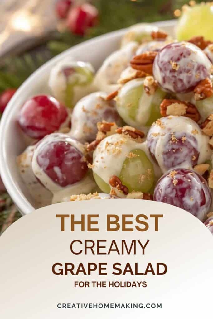 Serving spoon scooping creamy grape salad from a large holiday bowl