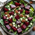 Roasted beet salad with fresh herbs on a holiday table
