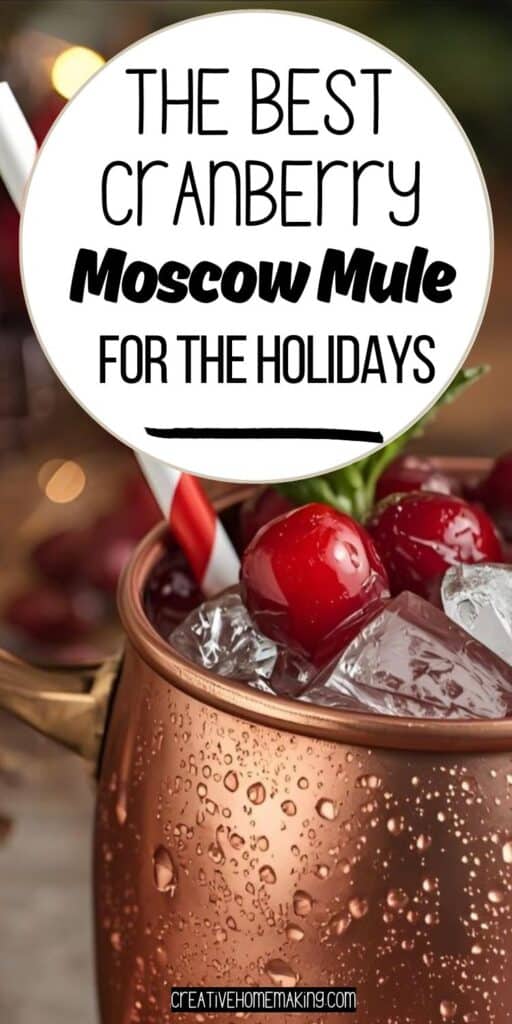 Holiday Moscow mule in copper mug with cranberries and rosemary garnish