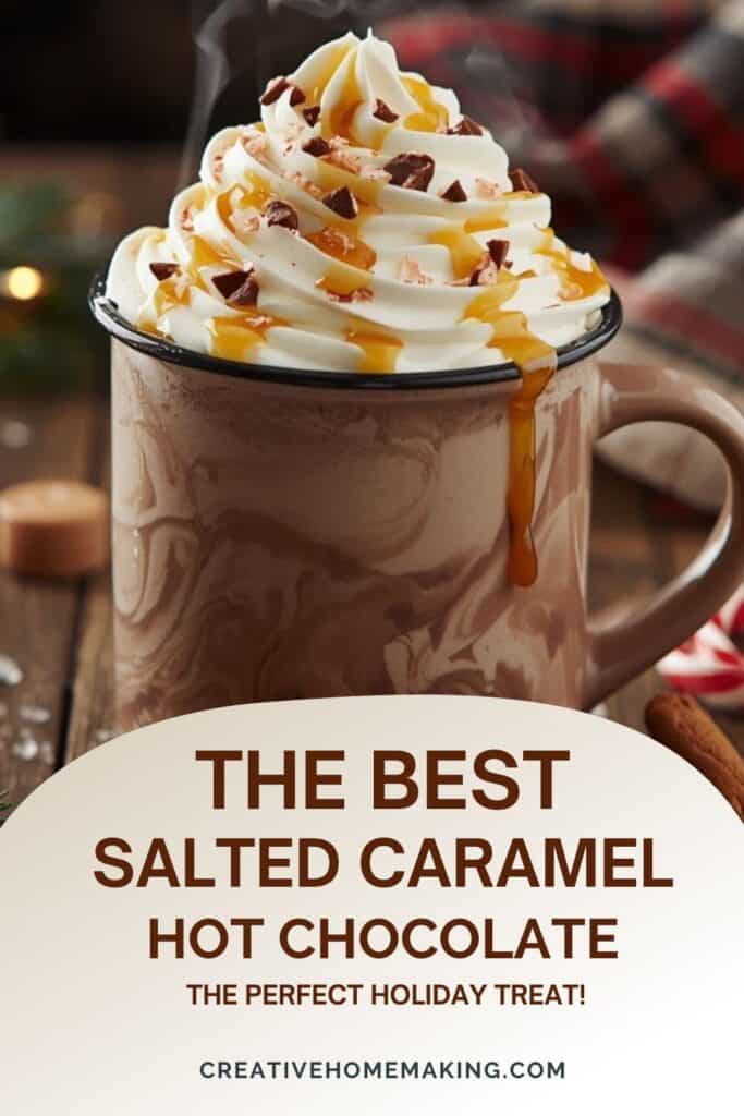 Cup of salted caramel hot chocolate topped with whipped cream, caramel drizzle, and a pinch of sea salt