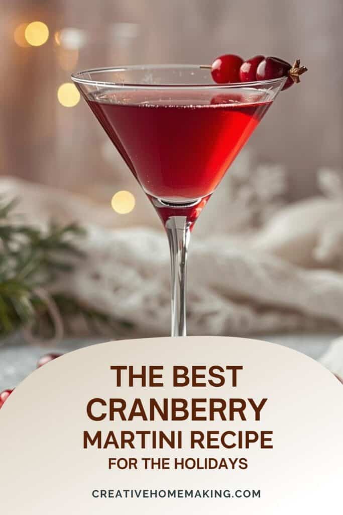 Glass of cranberry martini with fresh cranberries and lime twist for Christmas