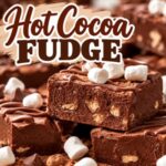 Looking for an easy Christmas fudge recipe? This hot chocolate fudge is rich, chocolatey, and topped with marshmallows for that classic hot cocoa flavor. It's a fun addition to your Christmas candy collection and makes a delicious treat to share with family and friends. Add it to your holiday dessert platter or package it up for homemade Christmas gifts.