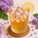 Learn how to make delicate lilac iced tea with fresh blossoms and black tea. Perfect for spring brunch, charming pretty brunch ideas, and a beautiful garden party drink station.